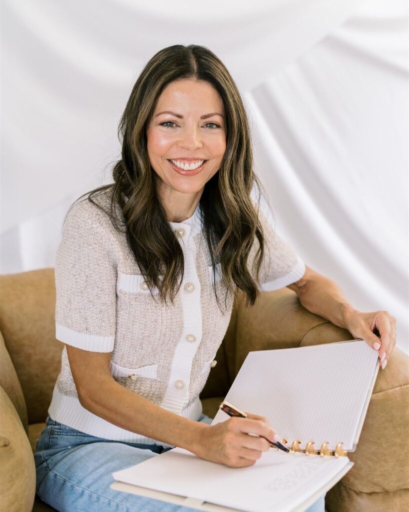 Tracy Dempsey journaling with God and writing in a notebook during a Her Faith at Work podcast feature